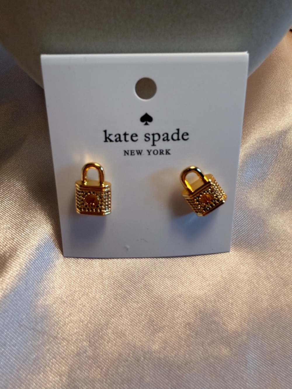 Kate Spade gold lock earrings